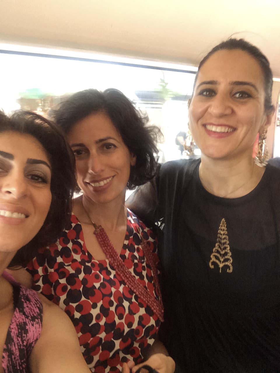 june 27 } wedding day. on the bus from the ceremony, which took place in the chelsea old town hall. my new friend razan, laila and me