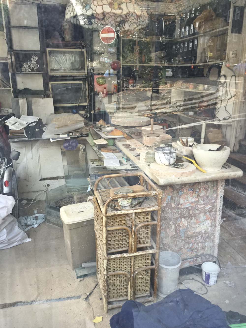 on my way back to the station i spot this through a window: what used to be a potter's studio? i don't know. the more i looked at this photo the more confused i because. it doesn't matter, i love it anyway